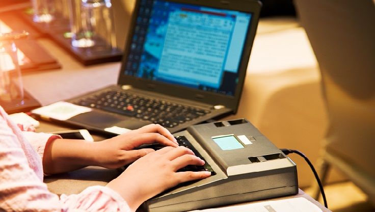 A CART device, or real-time stenograph, used to transcribe what is said in a class or meeting in real time.