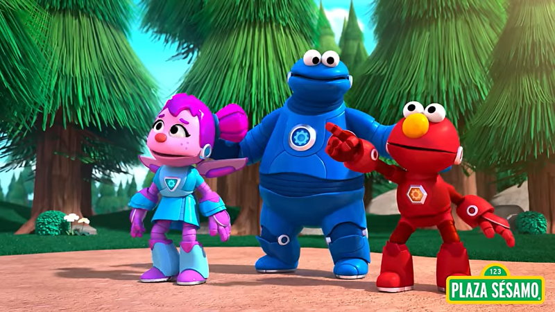 Abby, Cookie Monster, and Elmo, dressed as Meka Builders, stand in a forest.